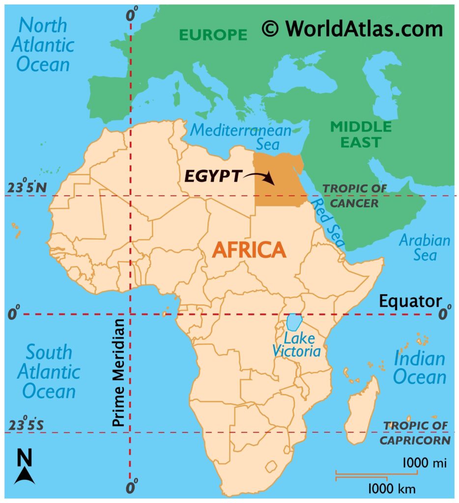 Teacher guiding students over Egypt map