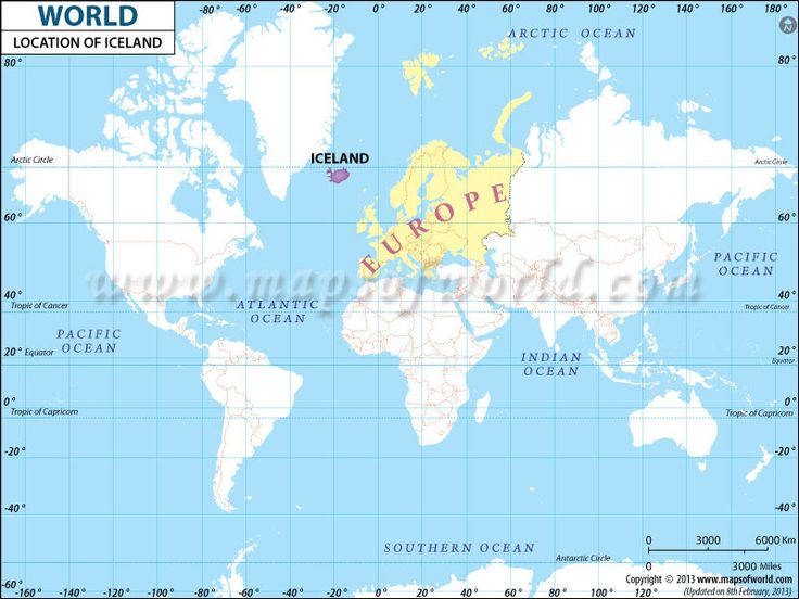 Young learner pointing at Iceland on labeled map