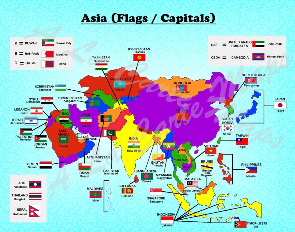 Examples of world and Asia country maps spread on table